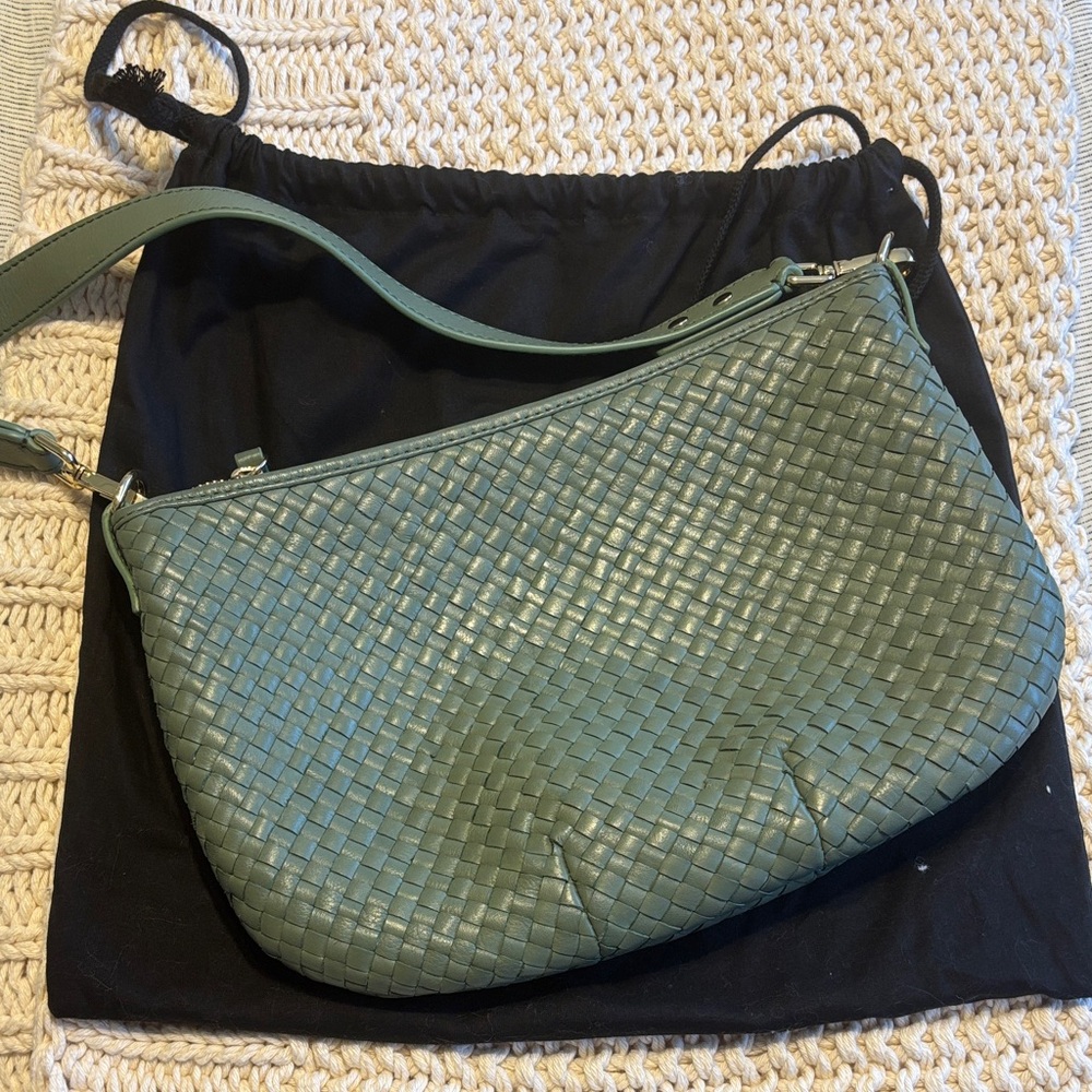 Quince mini woven leather shoulder bag in sage green.